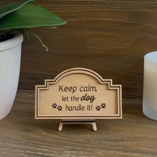 Cute Miniature Pine Plywood sign with easel stand featuring a laser engraved quote "every Meal you Make,Keep Calm, let the Dog handle it" Approx 6cm High and 10cm Wide. 