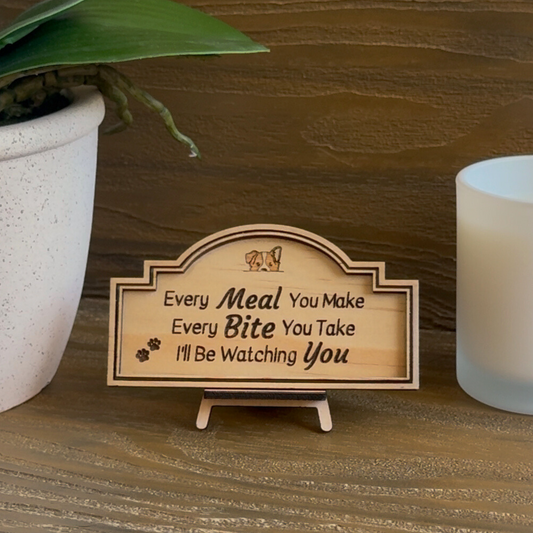 Cute Miniature Pine Plywood sign with easel stand featuring a laser engraved quote "every Meal you Make, Every Bite you Take, i'll be watching you" Approx 6cm High and 10cm Wide. 